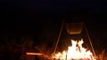 Cooking In A Pot On A Campfire Night Trip With A Tripod And Axe