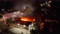 Aerial View Around A Building In Flames, Vandalism, During Protests,