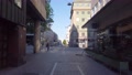 Woman Walks On Calm Street In Stockholm, At Palme's Death Place