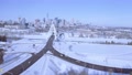 Bb1-2 Aerial Headed Towards Winter Snow Covered Modern Bridge Cityscape