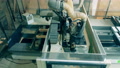 Modern Machine Works With Wood At A Plant, Processing It.