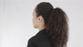 Portrait Of Appealing Young Brunette With Ponytail Standing And Looking