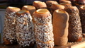 Czech National Pastry Trdelnik Bun With Various Sprinkles At The Street Food