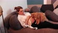 Red Cat Is Kneading Legs Of His Pregnant Owner Lady When She Pets Him