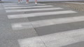 Young Girls Cross On The Zebra Crossing