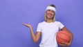 Young Basketball Player Woman Showing A Copy Space On A Palm And Holding Another