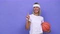 Young Basketball Player Woman Showing Number One With Finger