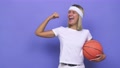 Young Basketball Player Woman Raising Fist After A Victory, Winner Concept