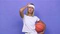 Young Basketball Player Woman Being Shocked, She Has Remembered Important