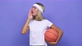 Young Basketball Player Woman Shouting And Holding Palm Near Opened Mouth
