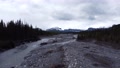 Drone Flying Over Cold River In Alberta