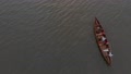 Aerial Top Down View Of Tourists In Long Boat Enjoying Canoeing On The