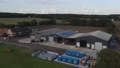 Aerial Footage Farm Yard In Essex England Large Storage Buildings Drone