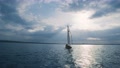 Cinematic Marine Landscape. Seascape. Luxurious Yacht Sailing Across Calm Waves