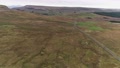 Aerial Footage Over Cars Travelling On A Long And Winding Road.