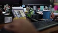 The Cluttered Desk Of An Office Worker's Cubical - Isolated Close Up