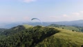 Zlatibor Mountain, Serbia. Aerial View Of Paragliding Parachute And Green