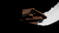 Dark Chocolate Stack Covered By Splashing White Milk And Cocoa Drink, Slow Mo