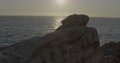 Beautiful 4k Backlit Drone Shot Of Atlantic Ocean With Rocky Foreground