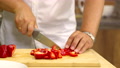 Close Up Man Cuts Fresh Red Pepper Into Slices Cooking Vegan Healthy Side Dish