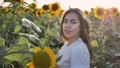 Portrait Young Beautiful And Cheerful Woman Posing In Field Sunflowers At Sunset