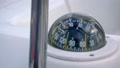 Marine Compass On A Sailing Yacht. The Compass On A Sailboat In Close Up