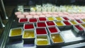 Slowly Panorama At Rich Assortment Of Fruit Jelly And Colorful Yogurt At Food