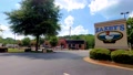 Zaxby's Chicken Restaurant Ease In To The Street Sign