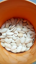 Pumpkin Seeds Snack Nuts In Plastic Protection Container
