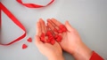 Child's Hands Holding Heart Candy In A Hands. Valentines And Mother Day Concept.