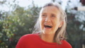 Close Up Face Of Happy Smilling Senior Woman With Grey Hair Looking At Camera