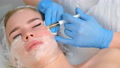 Cosmetologist Doing Injections Of Blood Plasma To Womans Face, Closeup View.