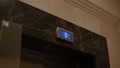 Light Blue Electronic Display Of The Elevator Changes Floor Numbers