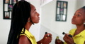 Black Woman Applies Make-Up Getting Ready, Morning Ritual