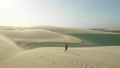 A Beautiful Girl Walking On Sand Dunes In Brazil