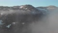 Revealing The Mountains From The Clouds In Norway