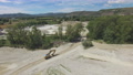 Drone Flies Backwards Over A Dry River In France
