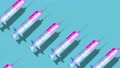 Video Animation Creative Pattern Made With A Syringe On Blue Background.