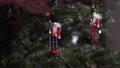 Decoration Toy Nutcracker On Christmas Tree 4k Shot. Nutcracker Soldier On