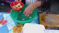 Thai Woman Taking Champignon Out Of Bowl After Cleaning And Cutting Them